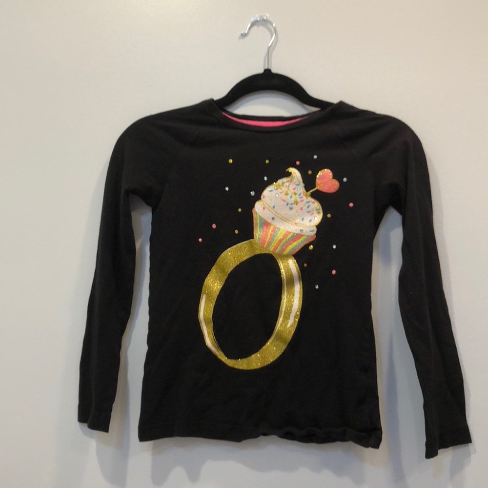 Black long sleeve shirt with a glittery cupcake